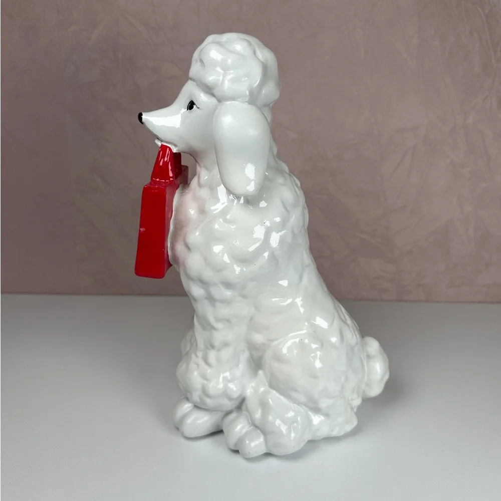 HomeGoods White Poodle Figurine with Red HomeGoods Bag